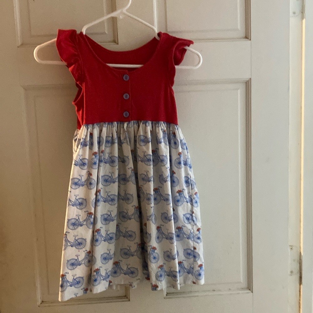 Eleanor Rose bike print and red dress